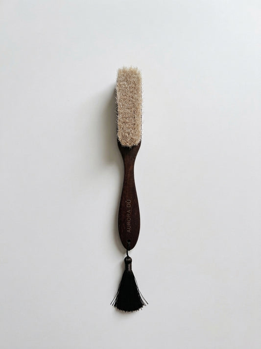 Handselected horsehair cashmere brush included with every cashmere piece