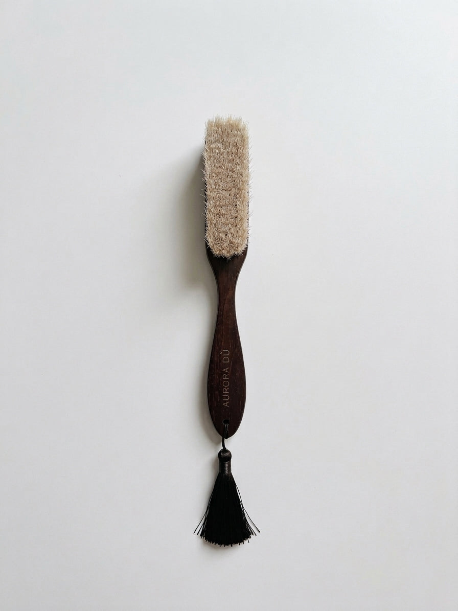 Handselected horsehair cashmere brush included with every cashmere piece